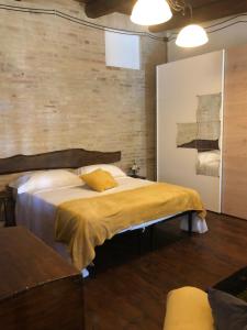 Posteľ alebo postele v izbe v ubytovaní Locanda del Sole