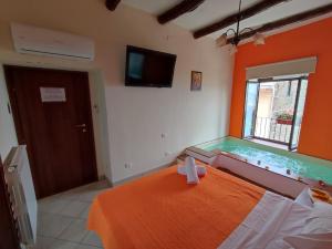 Postel nebo postele na pokoji v ubytování Patrizia Casa Vacanze