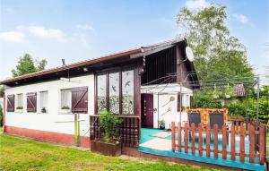 a house with a playground in front of it at Ferienhaus 1 In Thalfang in Thalfang