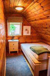 Postel nebo postele na pokoji v ubytování Na Soltyskiej