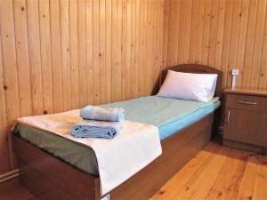 a small room with a bed and a pillow at Arpa Valley Cabin in Yeghegnadzor