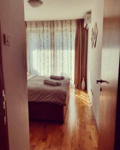 Voodi või voodid majutusasutuse Beauty apartment in Blue star complex Pržno Montenegro toas