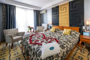 Postel nebo postele na pokoji v ubytování Duna Relax Hotel Ráckeve