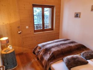 Postel nebo postele na pokoji v ubytování Appartement Nendaz Chardon Bleu