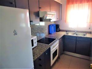 Η κουζίνα ή μικρή κουζίνα στο Residencial Forner LEK