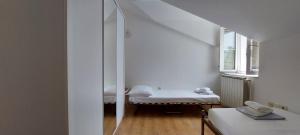 Posteľ alebo postele v izbe v ubytovaní Apartment Sunce