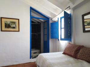 Posteľ alebo postele v izbe v ubytovaní Guesthouse La Tienda Cómpeta 21b