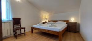 Posteľ alebo postele v izbe v ubytovaní Apartment Sunce