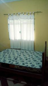 Ένα ή περισσότερα κρεβάτια σε δωμάτιο στο Casa Parada Modelo