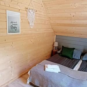 Tempat tidur dalam kamar di MikroKlimat