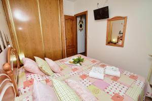 Posteľ alebo postele v izbe v ubytovaní Apartamento de Pilar - 7000