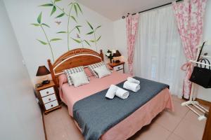 Posteľ alebo postele v izbe v ubytovaní Apartamento de Pilar - 7000