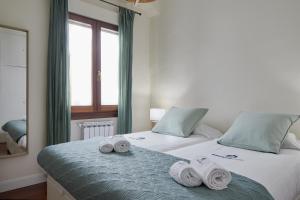 Posteľ alebo postele v izbe v ubytovaní Zinema - Basque Stay