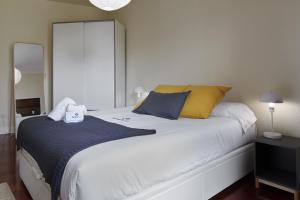 Posteľ alebo postele v izbe v ubytovaní Zinema - Basque Stay