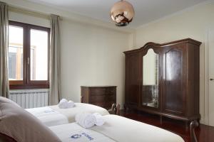 Posteľ alebo postele v izbe v ubytovaní Zinema - Basque Stay