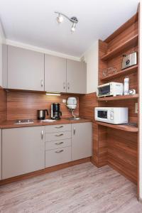 Kuchyň nebo kuchyňský kout v ubytování Ferienwohnung An Bord