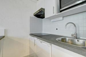 Kuchyň nebo kuchyňský kout v ubytování Atray R3 Studio - Snow and Trek - Morzine