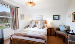 Ένα ή περισσότερα κρεβάτια σε δωμάτιο στο Easedale Lodge