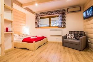 Posteľ alebo postele v izbe v ubytovaní Apartamenty Tatra View Kościelisko