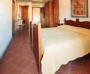 Postel nebo postele na pokoji v ubytování Residenza Antica Canonica