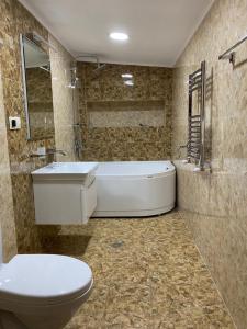 Koupelna v ubytování Your home in Tbilisi