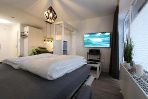 Μια τηλεόραση ή/και κέντρο ψυχαγωγίας στο Kirchweg 9 Auszeit 2