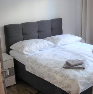 Postel nebo postele na pokoji v ubytování Apartment Ivan J Selce