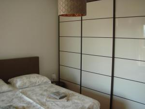 Postel nebo postele na pokoji v ubytování Apartment Ivan J Selce