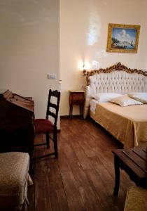 Posteľ alebo postele v izbe v ubytovaní B&B Joan's Heritage