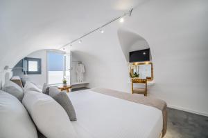 TV a/nebo společenská místnost v ubytování Serenità Luxury Suites