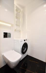 Kúpeľňa v ubytovaní Apartament Słoneczny przy Rybackiej