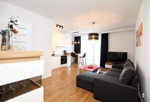 Posedenie v ubytovaní Apartament Słoneczny przy Rybackiej