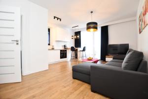 Posedenie v ubytovaní Apartament Słoneczny przy Rybackiej