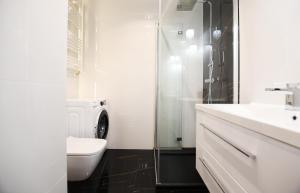 Kúpeľňa v ubytovaní Apartament Słoneczny przy Rybackiej