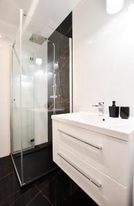 Kúpeľňa v ubytovaní Apartament Słoneczny przy Rybackiej + 18 fotografií
