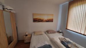 Кровать или кровати в номере Pomorie Beach Resort