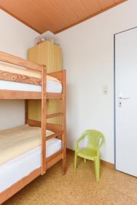 Postel nebo postele na pokoji v ubytování Ferienwohnung An Bord