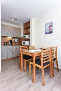 Kuchyň nebo kuchyňský kout v ubytování Ferienwohnung An Bord