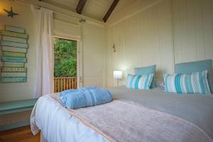 Łóżko lub łóżka w pokoju w obiekcie Windhoek on Sea