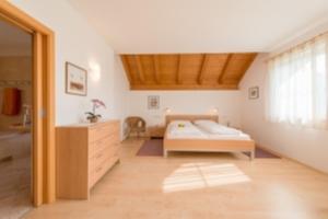 Letto o letti in una camera di Dissertorihof