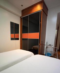 Postel nebo postele na pokoji v ubytování Hotel Lluna