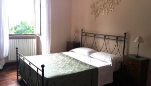 En eller flere senge i et værelse på Piazza degli Angeli