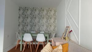 Posedenie v ubytovaní O Lagar apartamento grande y luminoso. 8 personas.