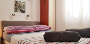 Postel nebo postele na pokoji v ubytování Apartman Beus