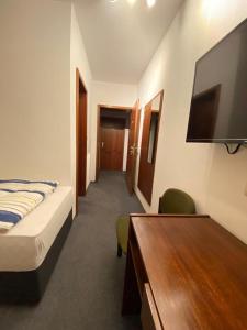 Postel nebo postele na pokoji v ubytování Hotel -Pension-Weller