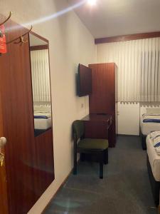 Postel nebo postele na pokoji v ubytování Hotel -Pension-Weller