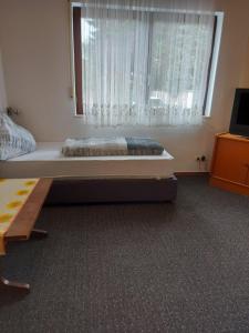 Postel nebo postele na pokoji v ubytování Hotel -Pension-Weller