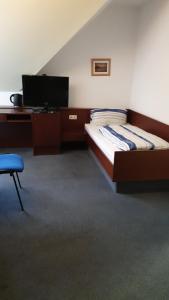 TV a/nebo společenská místnost v ubytování Hotel -Pension-Weller