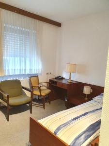 Posezení v ubytování Hotel -Pension-Weller