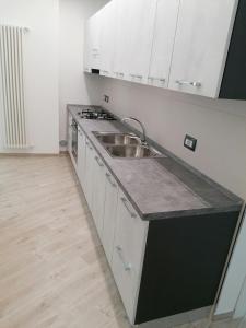 Kuchyňa alebo kuchynka v ubytovaní Vasto in centro